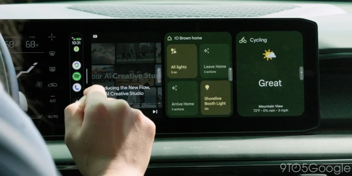 Google Android Auto: Mão tocando tela de painel de carro com cards de casa inteligente e ciclismo em verde escuro, com marca d'água do portal