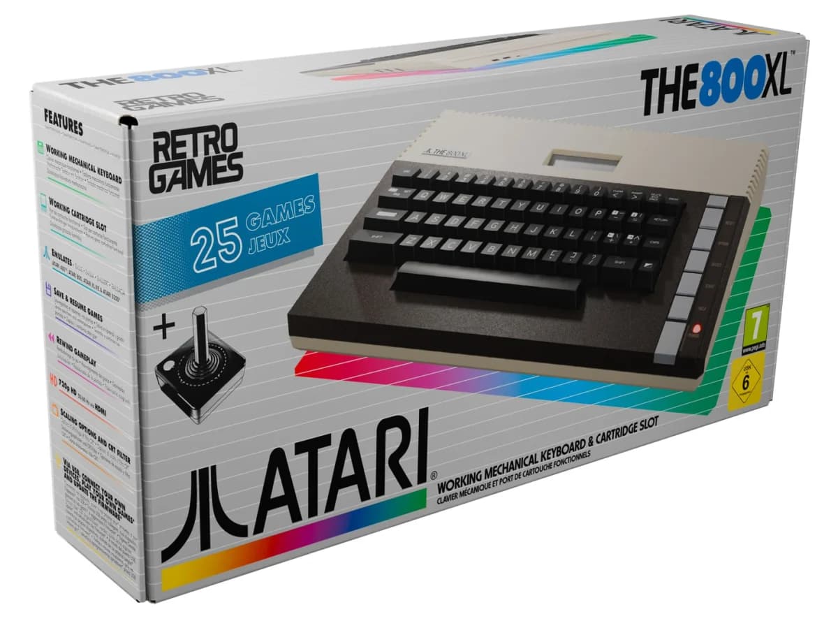 Atari THE 800XL: Caixa frontal do Atari THE 800XL com imagem do teclado, joystick e textos sobre teclado mecânico e cartucho