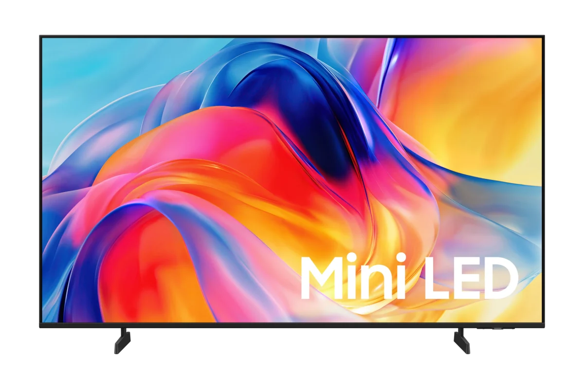 Samsung TV: TV de tela plana com moldura fina e pés, em vista frontal, sobre fundo cinza claro, com imagem colorida abstrata na tela.